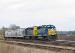 CSX 8093 & 8121 lead a train towards the signals at Warmac